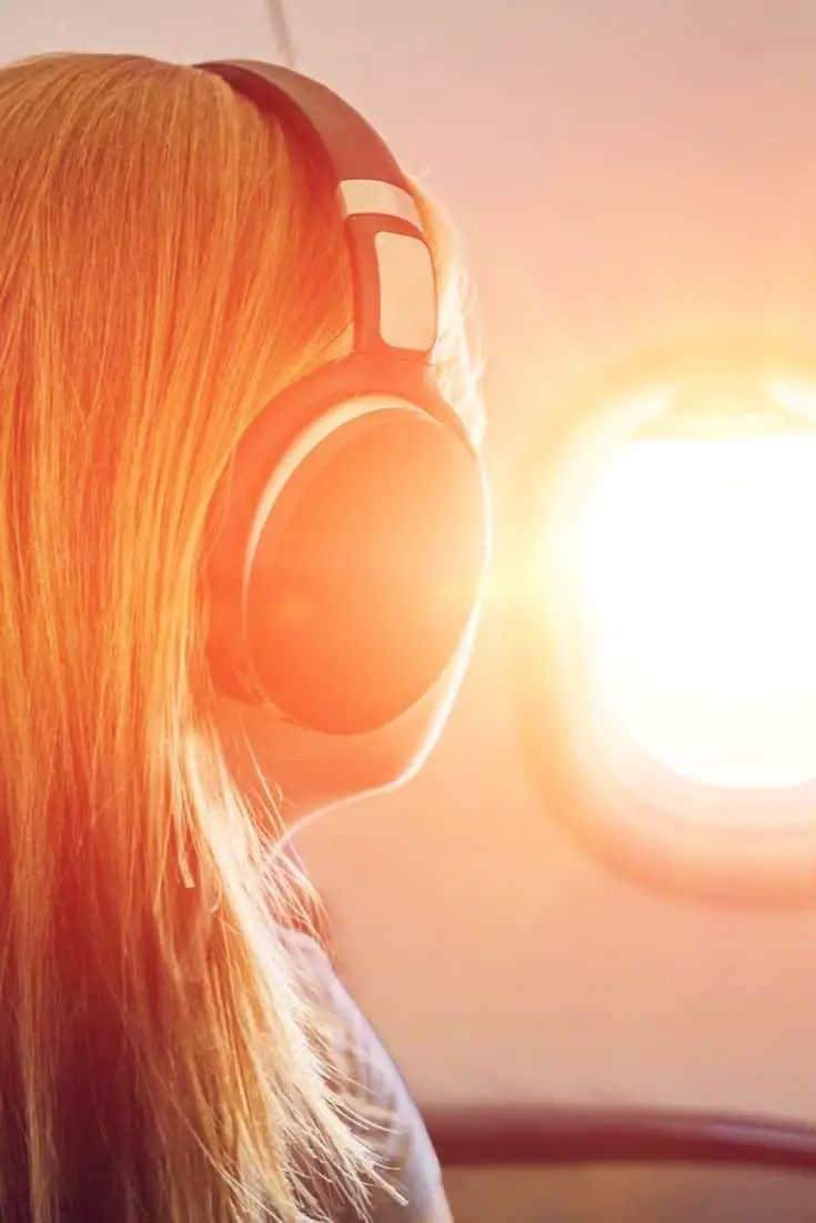 Noise cancelling headphones om je af te zonderen in het vliegtuig